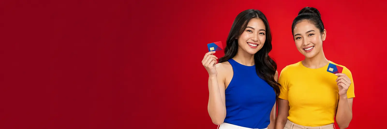 TM SIM Registration Online 2026 1 Two Filipino women holding prepaid SIM cards for TM SIM registration online